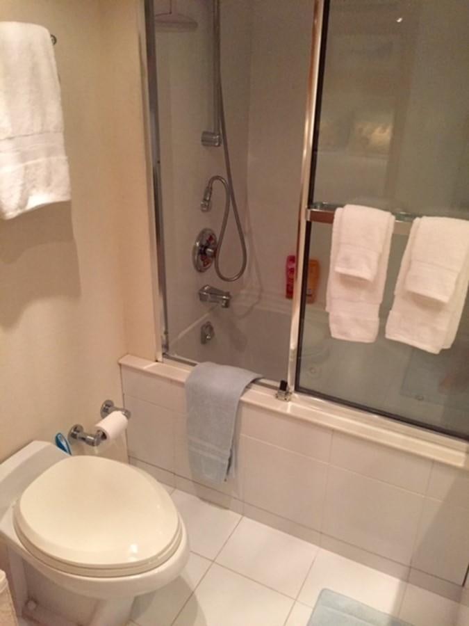 a bathroom with a shower and toilet aboard WHALE'S WAY Yacht for Sale