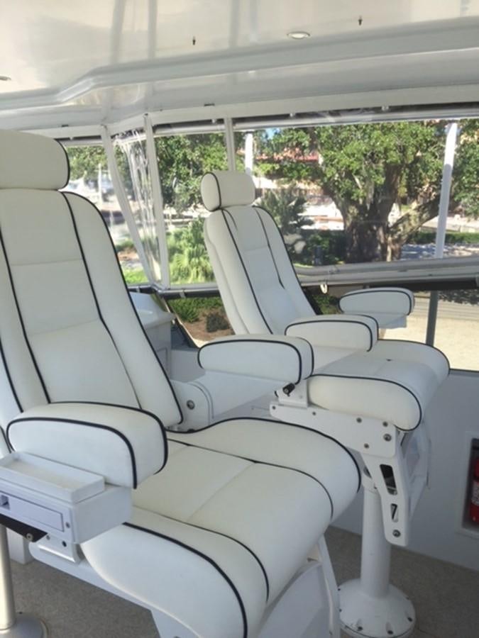 a vehicle with seats and a bench aboard WHALE'S WAY Yacht for Sale