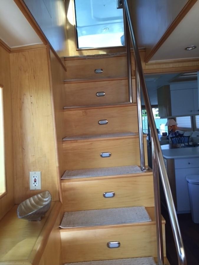 a wooden cabinet in a room aboard WHALE'S WAY Yacht for Sale