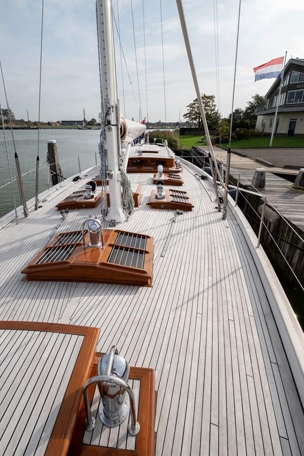 a deck with boats on it aboard HOEK CLASSIC 73 DIXBAY Yacht for Sale