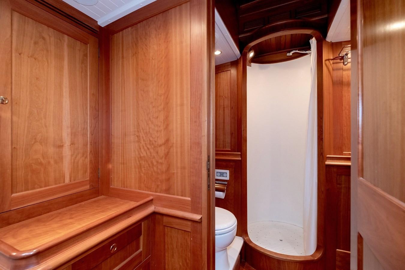 a bathroom with wooden walls aboard HOEK CLASSIC 73 DIXBAY Yacht for Sale
