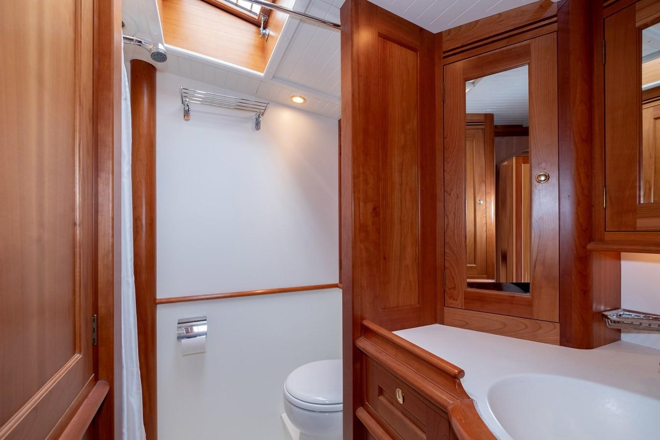 a bathroom with a sink and a toilet aboard HOEK CLASSIC 73 DIXBAY Yacht for Sale
