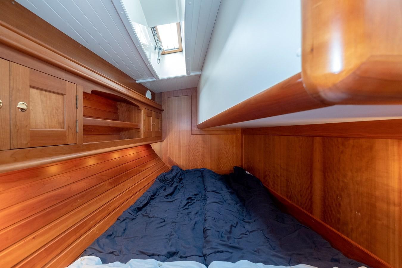 a bed in a room aboard HOEK CLASSIC 73 DIXBAY Yacht for Sale