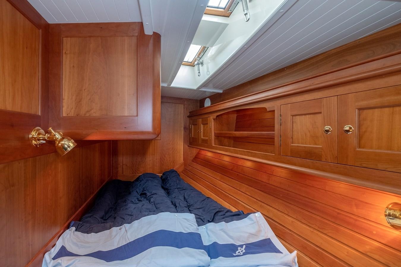 a room with wooden cabinets aboard HOEK CLASSIC 73 DIXBAY Yacht for Sale
