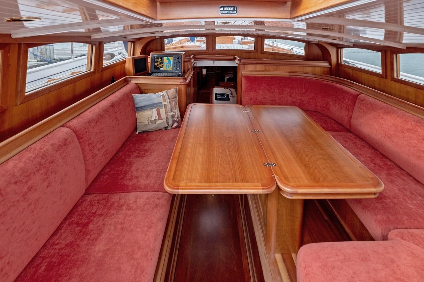 a table in a train aboard HOEK CLASSIC 73 DIXBAY Yacht for Sale