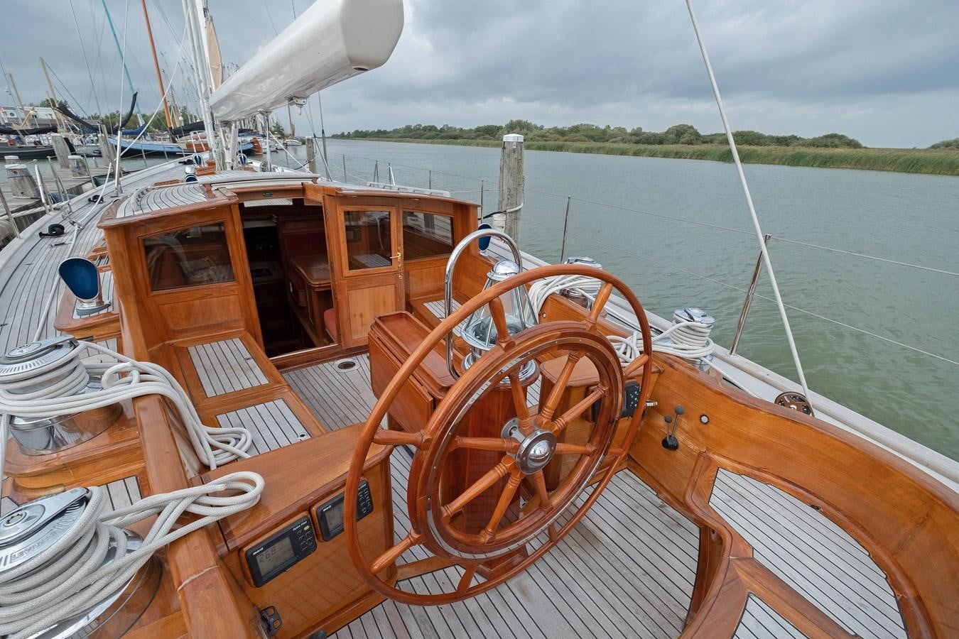a wooden boat on the water aboard HOEK CLASSIC 73 DIXBAY Yacht for Sale