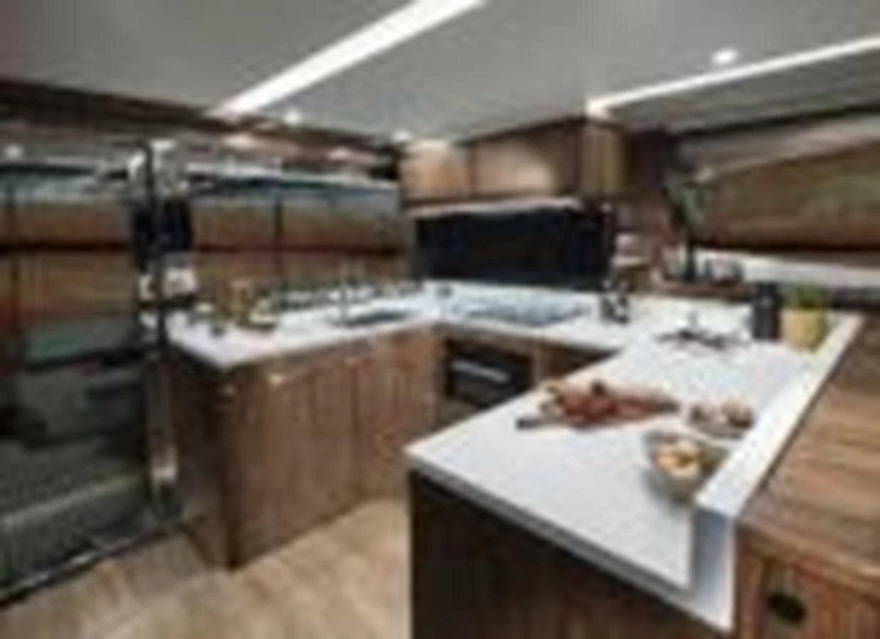 a kitchen with a large sink aboard RIVIERA 72 SPORTS MOTOR YACHT Yacht for Sale