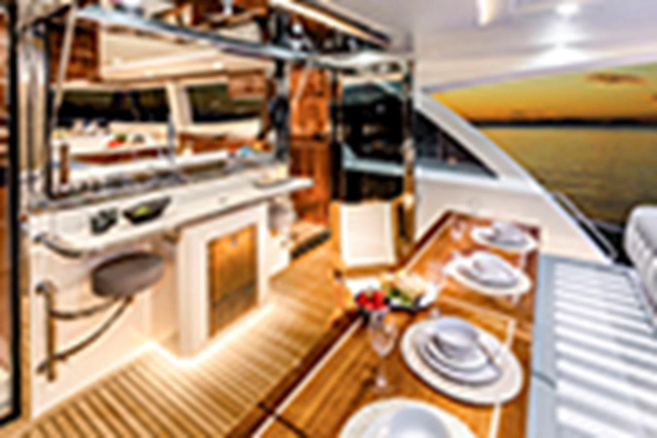 a room with a table and a machine aboard RIVIERA 72 SPORTS MOTOR YACHT Yacht for Sale
