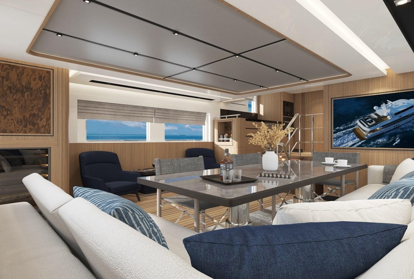 a living room with a table and couches aboard BERING B72 Yacht for Sale