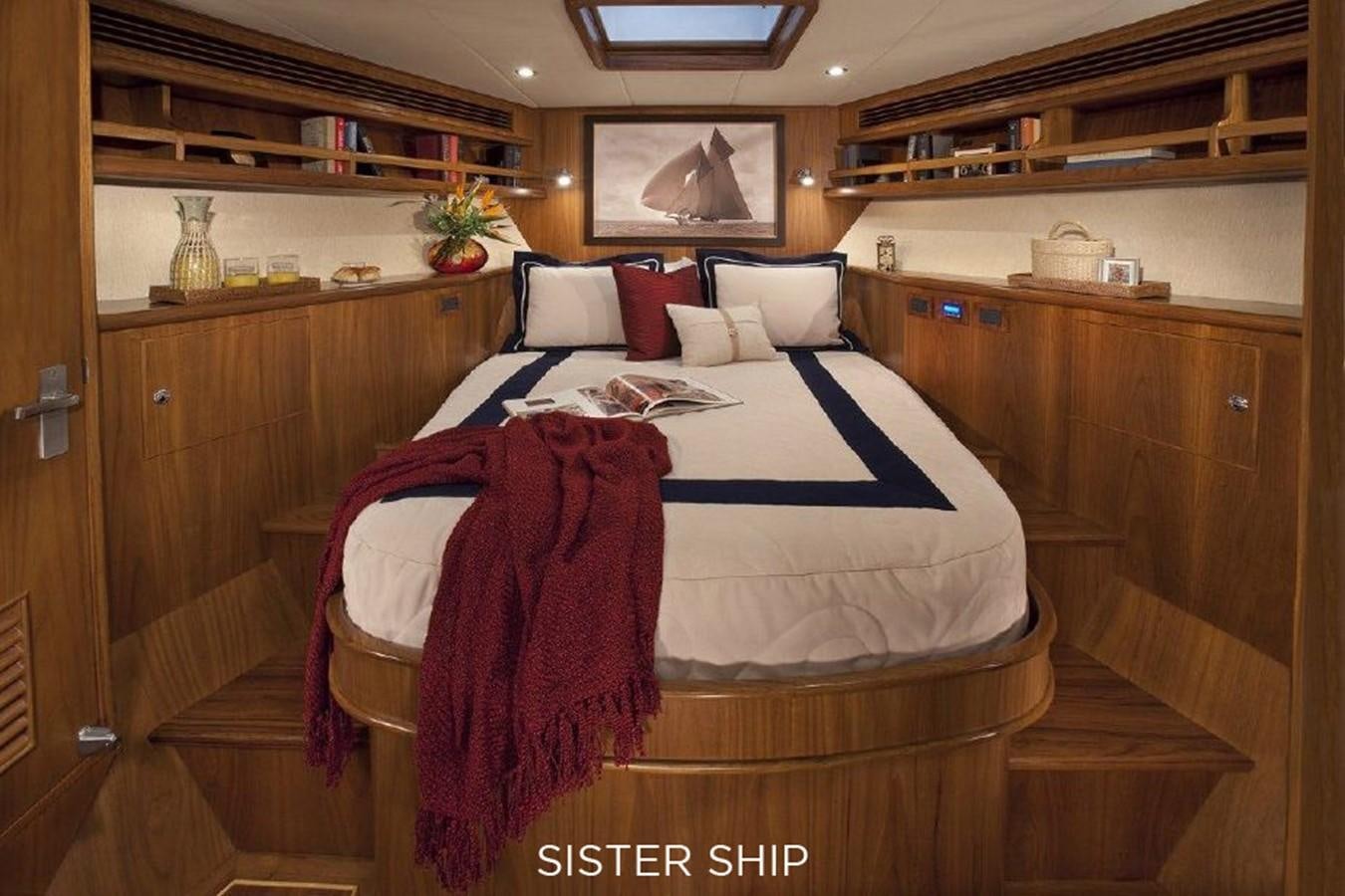 a bed in a room aboard 700 MY Yacht for Sale