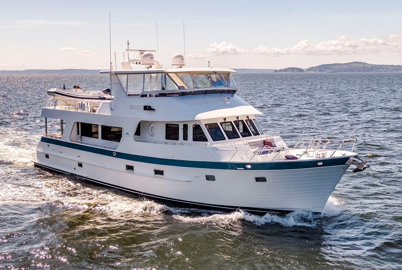 a white boat in the water aboard 700 MY Yacht for Sale