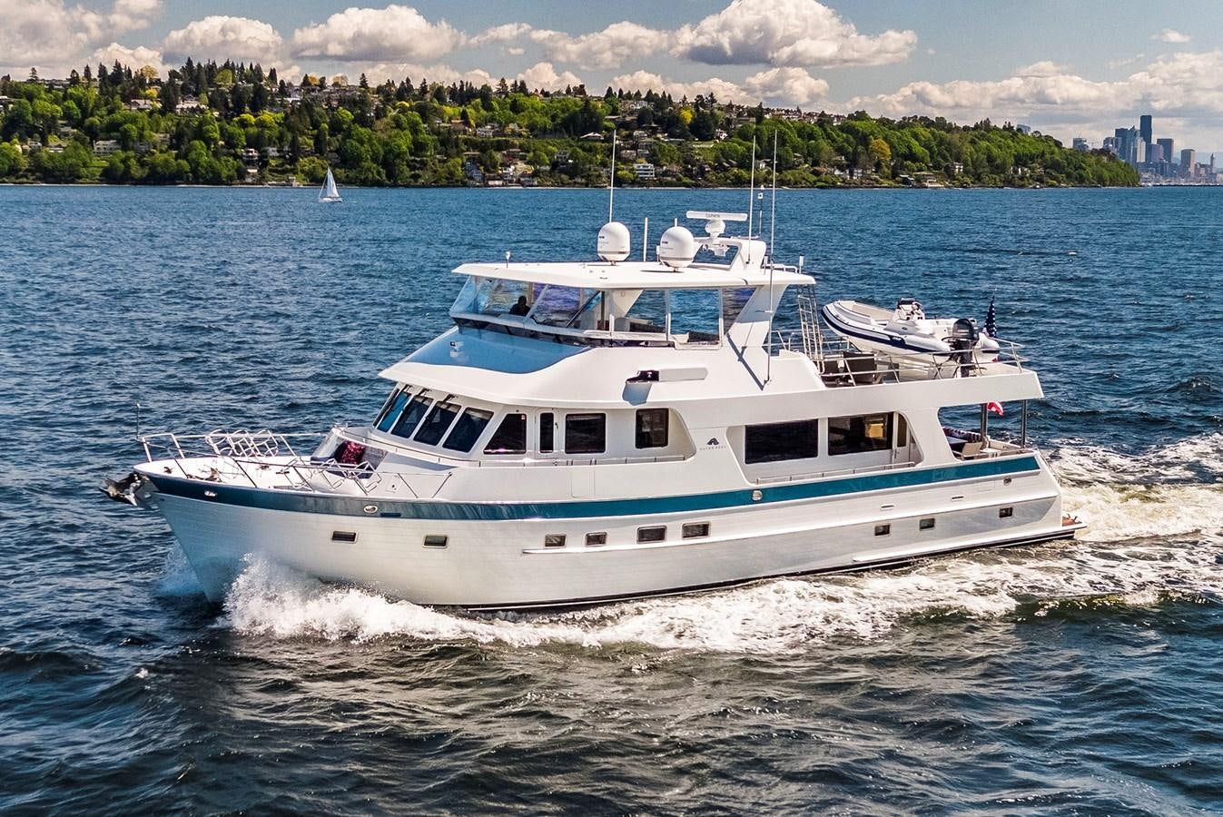 a white boat on the water aboard 700 MY Yacht for Sale