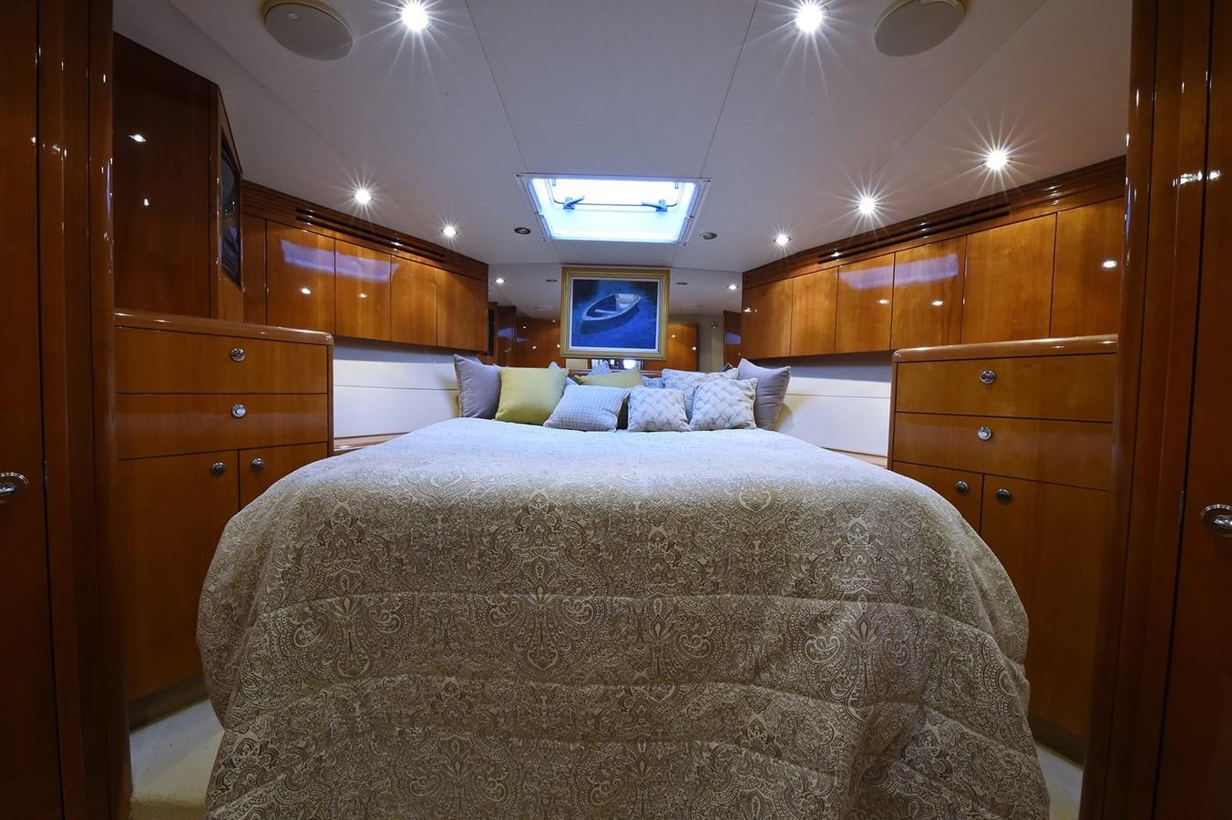 a bed in a room aboard AMORE MIO 1 Yacht for Sale