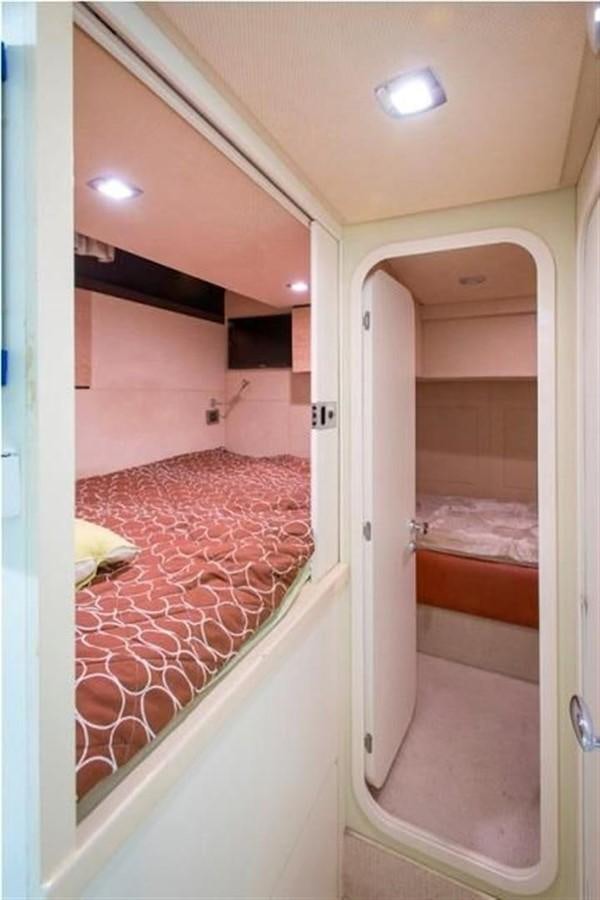 a room with a bed and a hallway aboard RAMAYA Yacht for Sale