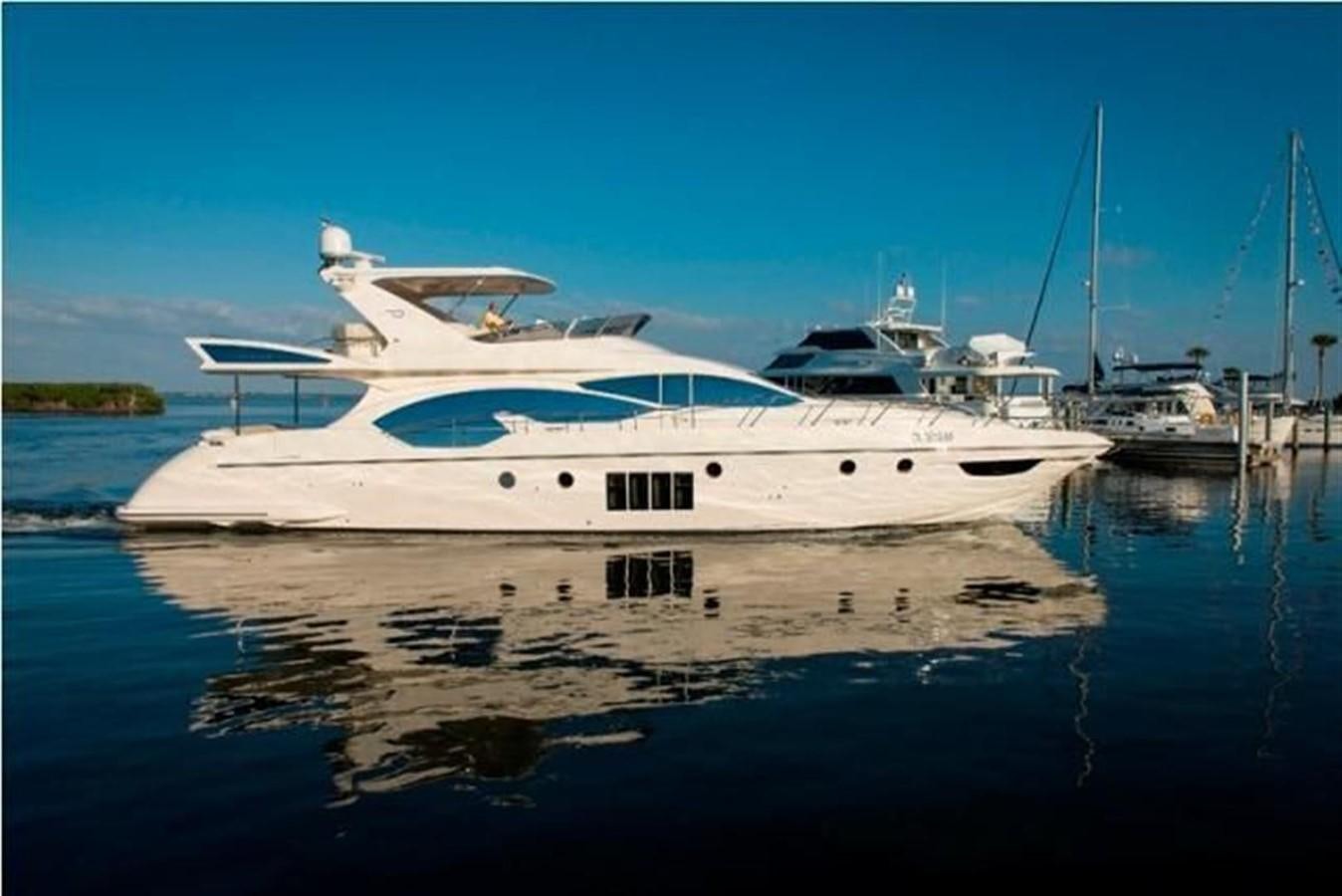a white yacht in the water aboard RAMAYA Yacht for Sale