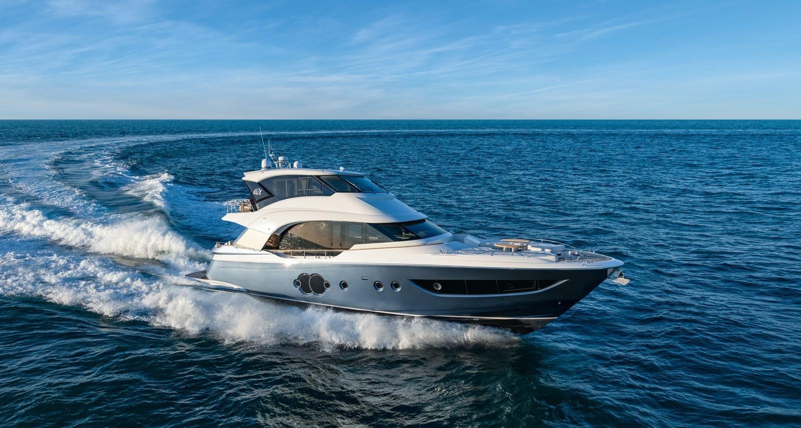 a white yacht on the water aboard MCY 70 SKYLOUNGE  Yacht for Sale