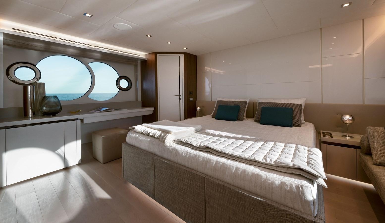 a room with a bed and a desk aboard MCY 70 SKYLOUNGE  Yacht for Sale