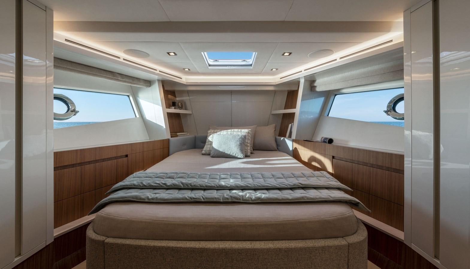 a bed in a cabin aboard MCY 70 SKYLOUNGE  Yacht for Sale