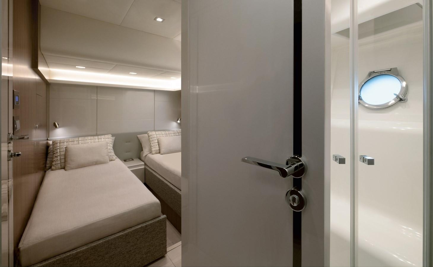 a room with a bed and a mirror aboard MCY 70 SKYLOUNGE  Yacht for Sale