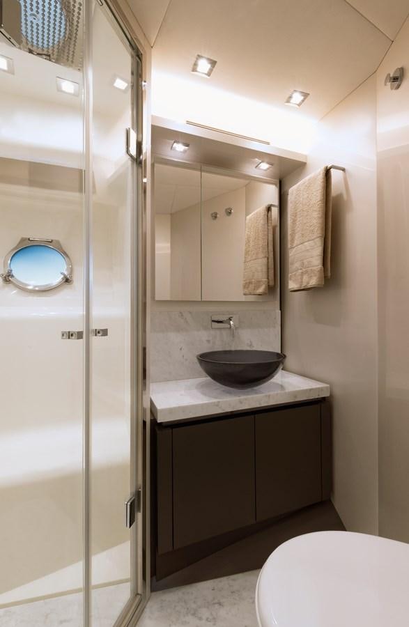 a bathroom with a sink and a shower aboard MCY 70 SKYLOUNGE  Yacht for Sale