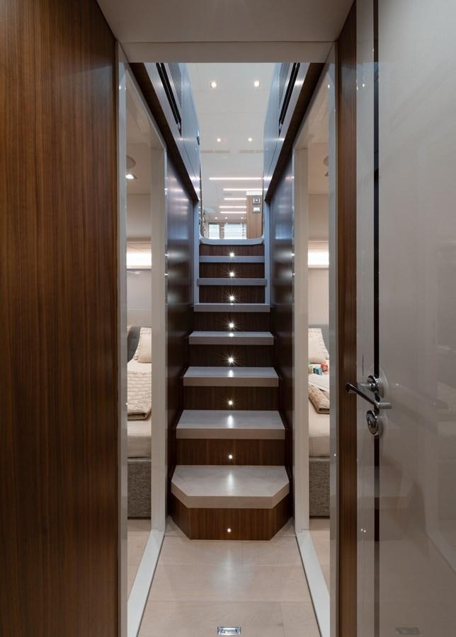 a room with a wood door aboard MCY 70 SKYLOUNGE  Yacht for Sale