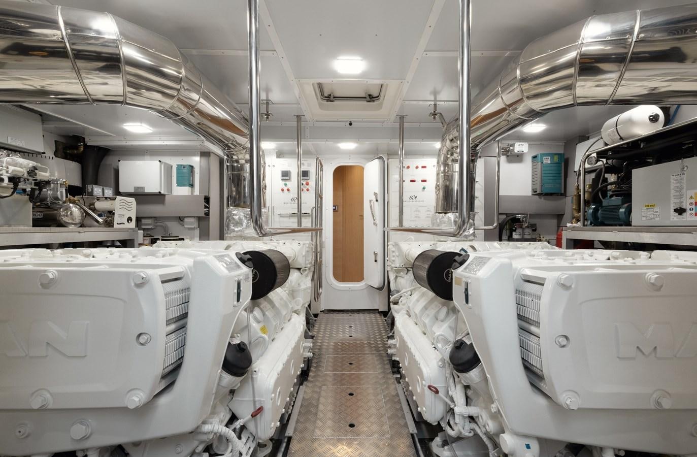a room with white machines aboard MCY 70 SKYLOUNGE  Yacht for Sale