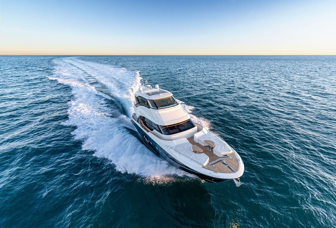 a boat on the water aboard MCY 70 SKYLOUNGE  Yacht for Sale