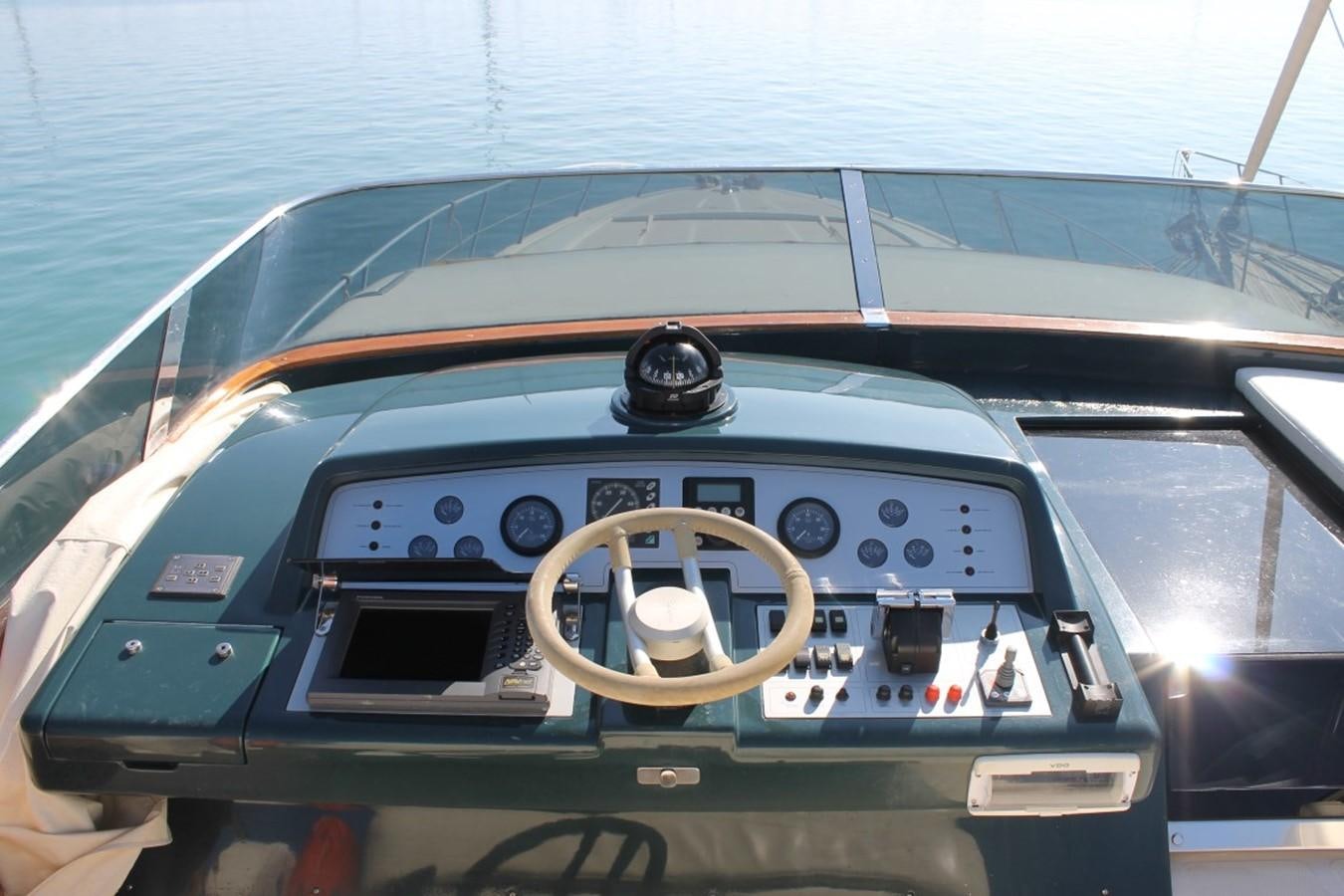the interior of a car aboard MACAMI Yacht for Sale