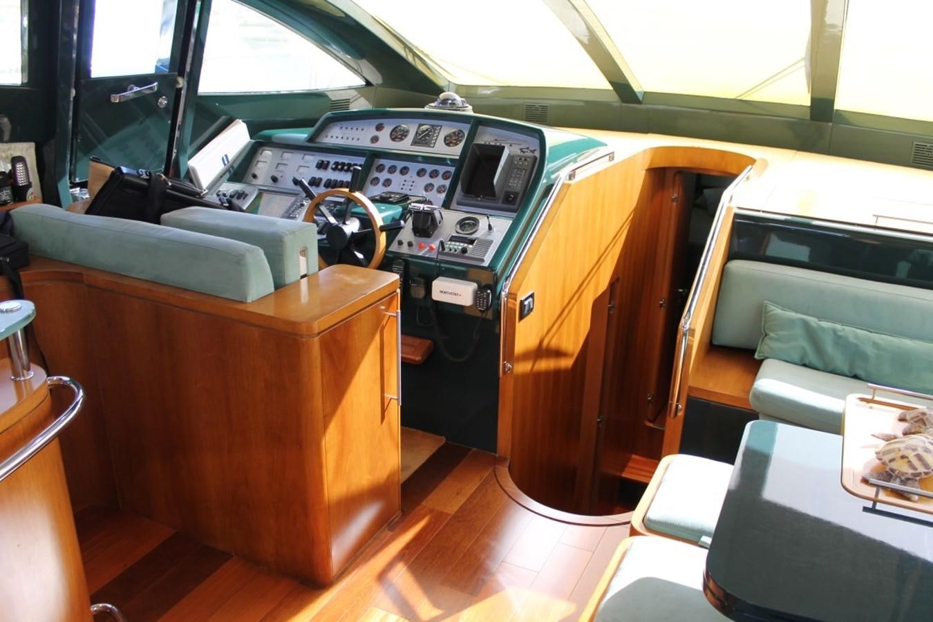 a cockpit with a wooden seat aboard MACAMI Yacht for Sale