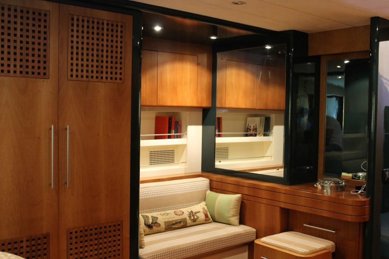a room with a bed and a cupboard aboard MACAMI Yacht for Sale