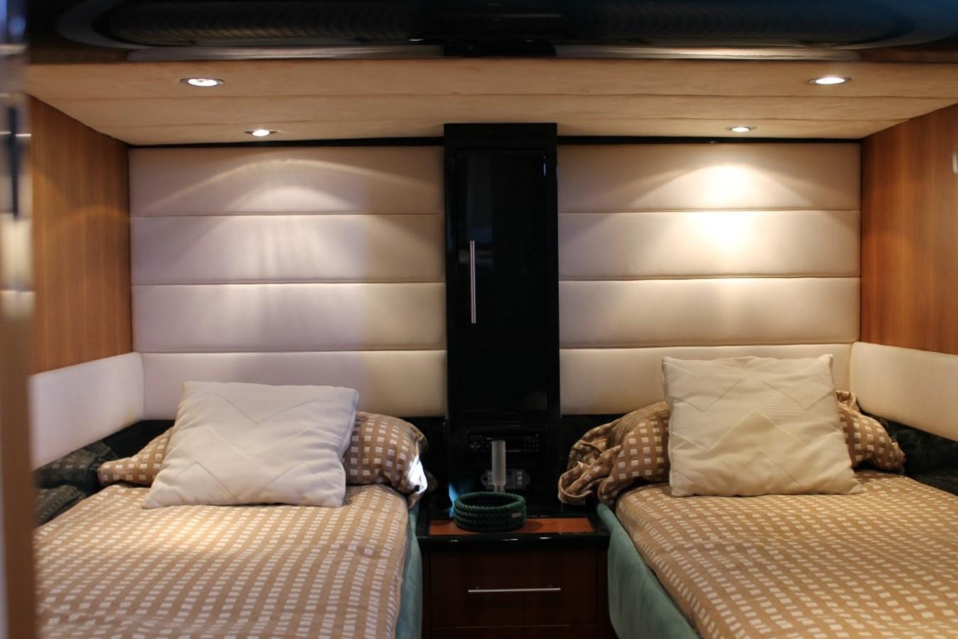 a room with two beds aboard MACAMI Yacht for Sale