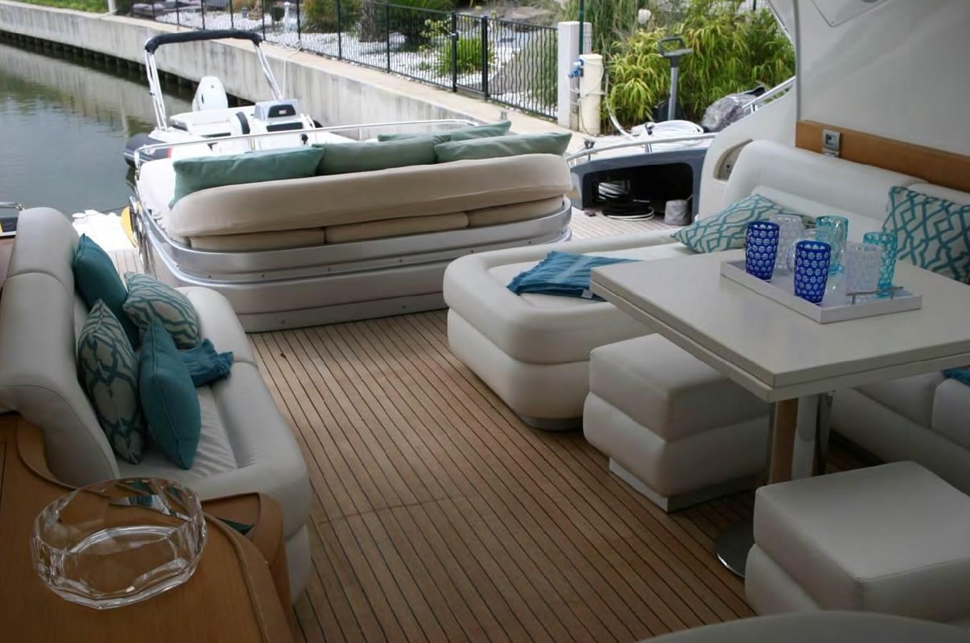 a boat on a deck aboard FOX Yacht for Sale