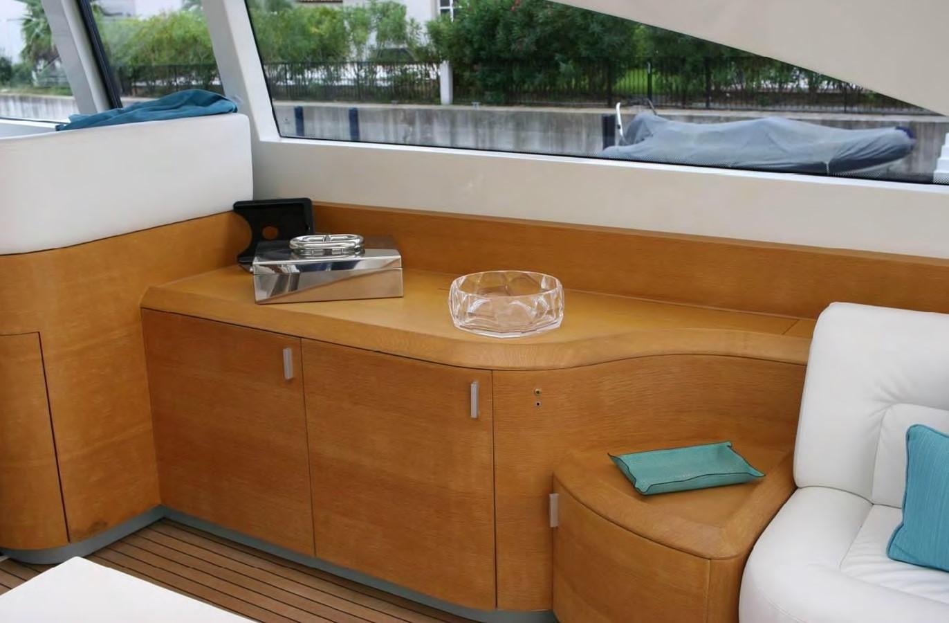 a desk with a computer on it aboard FOX Yacht for Sale