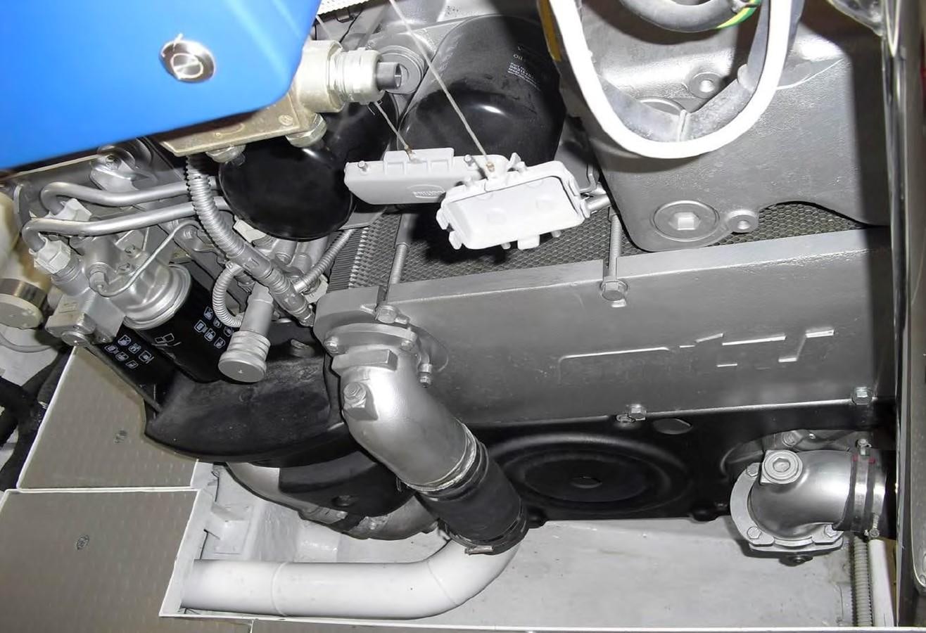 a close-up of a car engine aboard FOX Yacht for Sale
