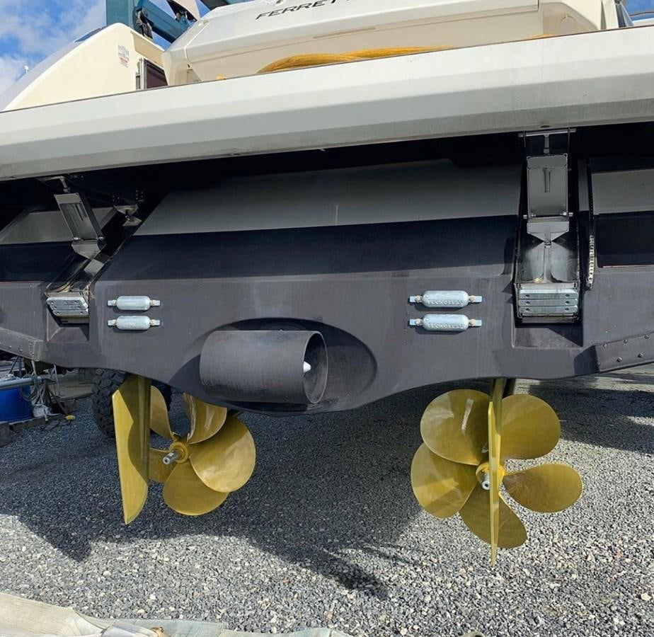 a large grey vehicle with a yellow bow aboard L’ABEILLE Yacht for Sale
