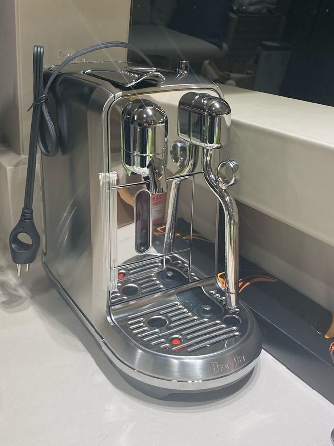 a machine on the counter aboard L’ABEILLE Yacht for Sale