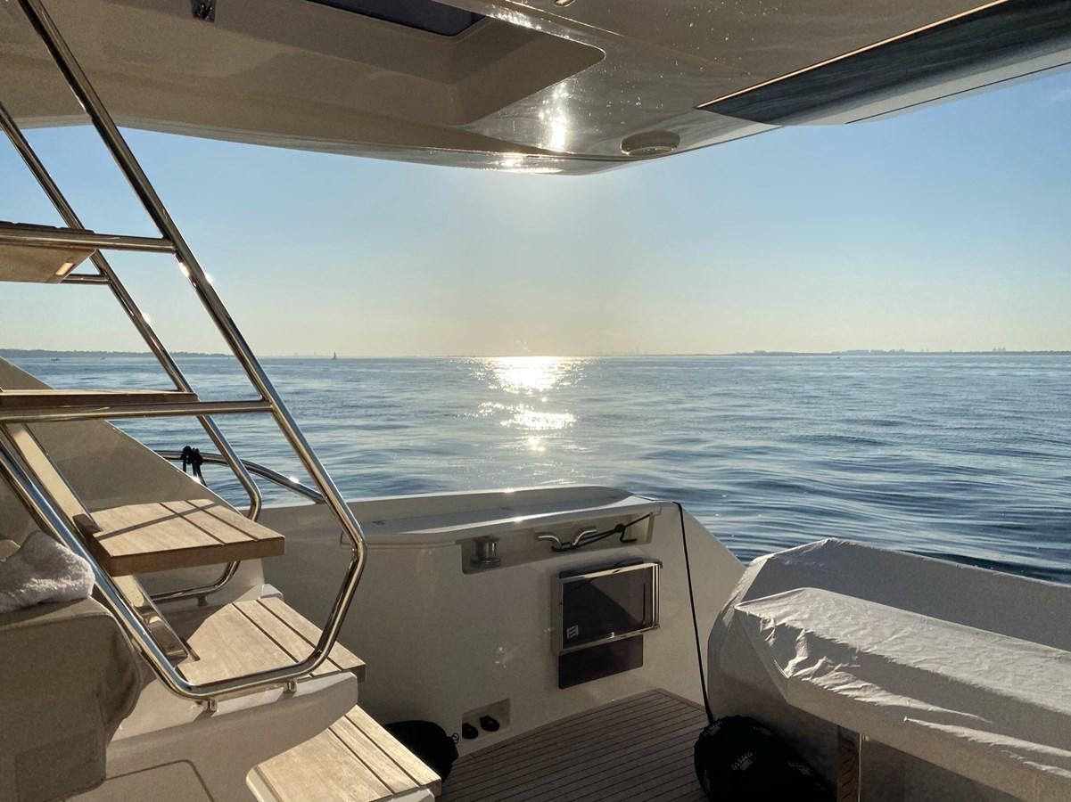 a boat on the water aboard L’ABEILLE Yacht for Sale