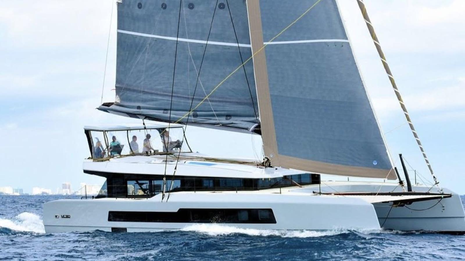 a boat on the water aboard 2022 MCCONAGHY MC59P Yacht for Sale