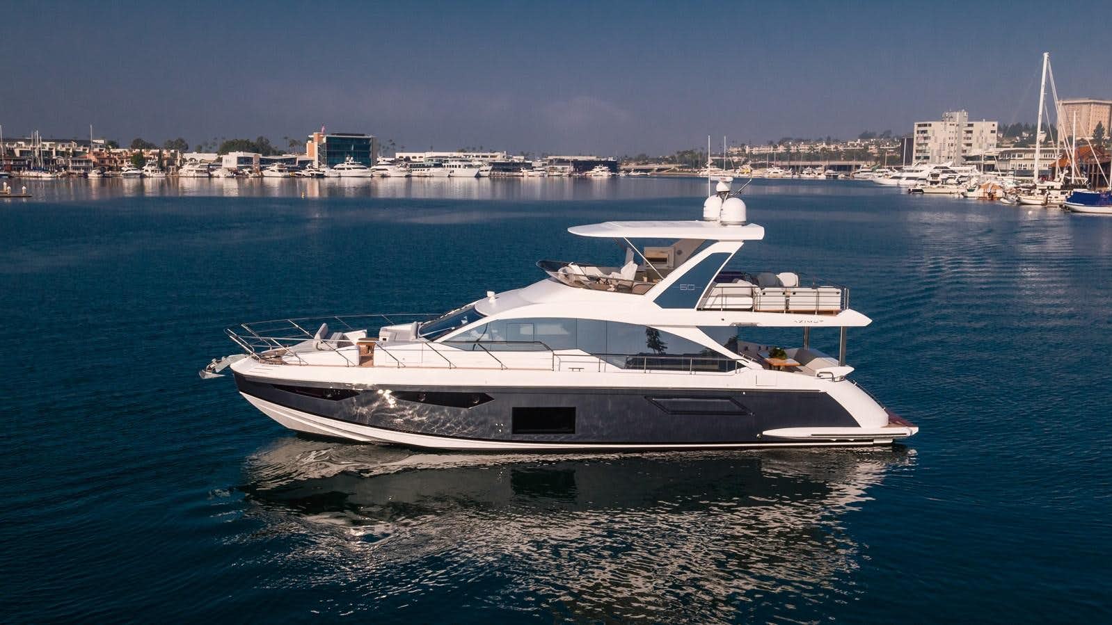 a white yacht in the water aboard AZIMUT 60 FLYBRIDGE  Yacht for Sale