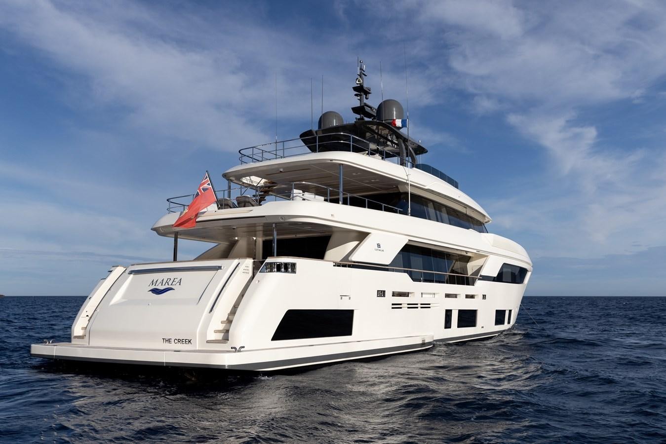 a white yacht in the water aboard EROS Yacht for Sale