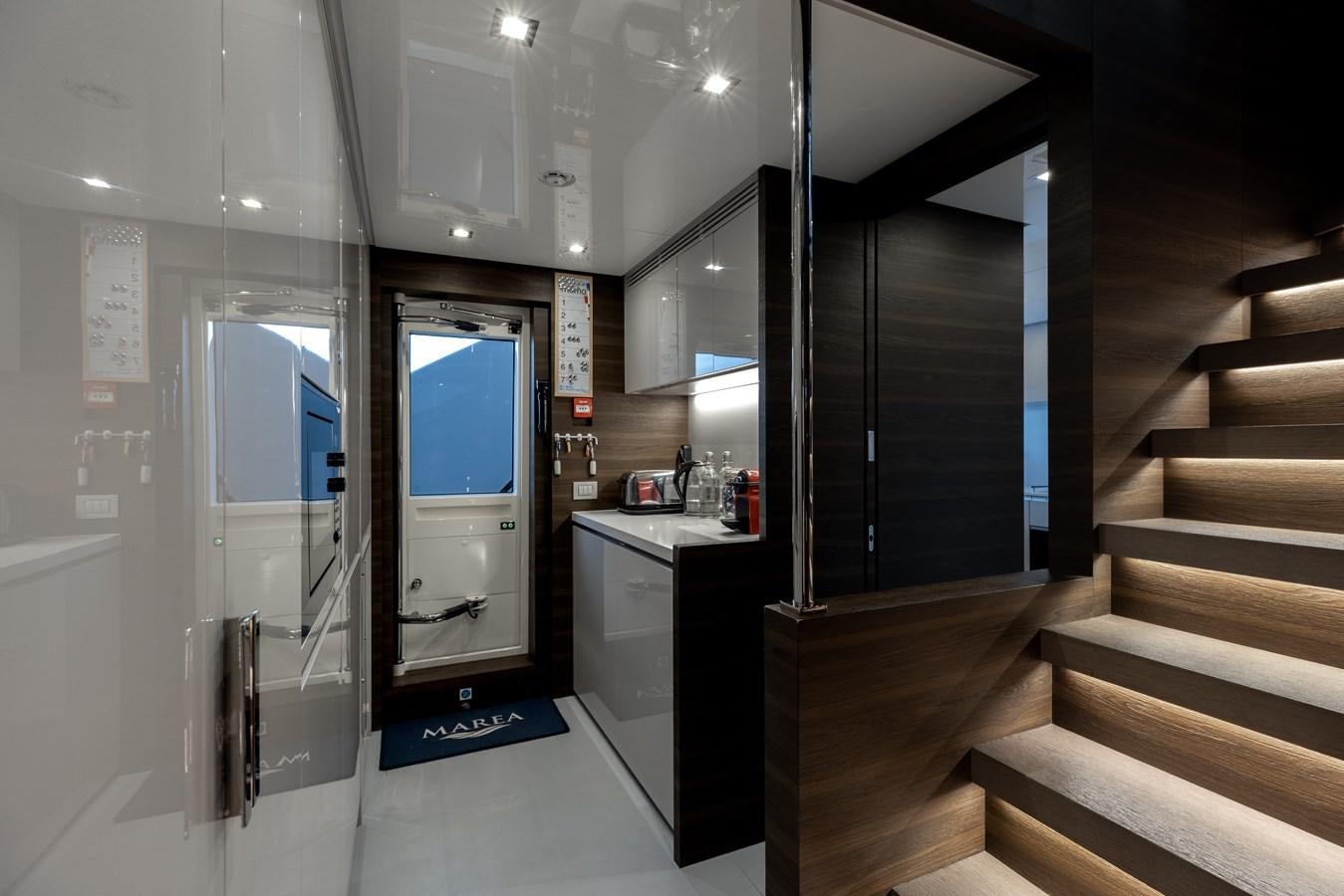 a bathroom with a glass door aboard EROS Yacht for Sale