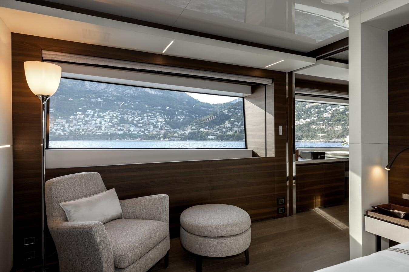 a room with a large window aboard EROS Yacht for Sale
