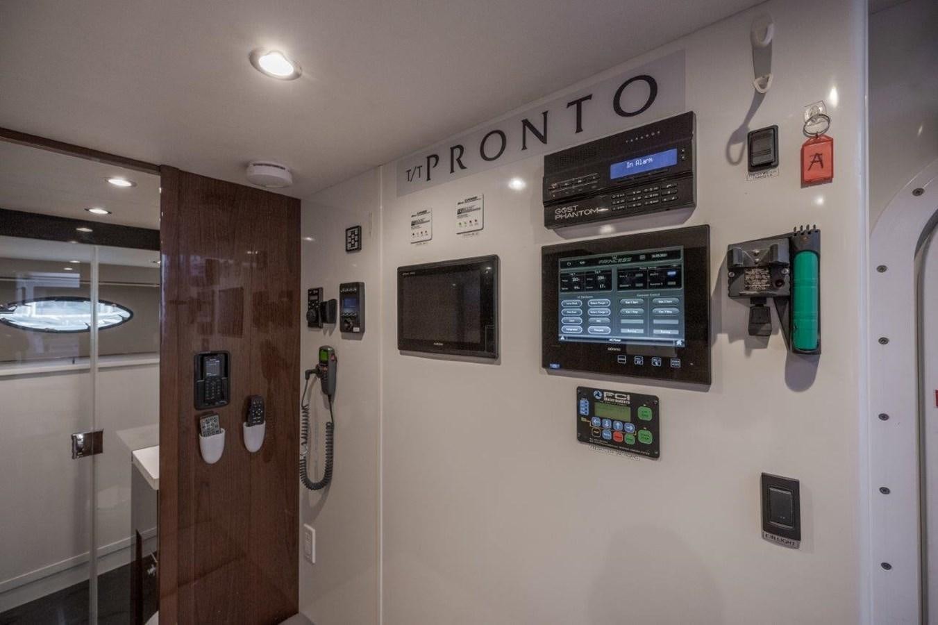 a wall with a door and a mirror aboard PRONTO Yacht for Sale