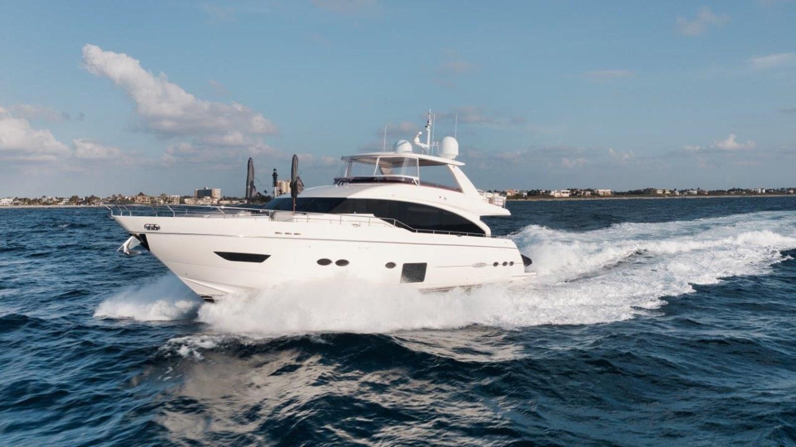 a white boat on the water aboard PRONTO Yacht for Sale