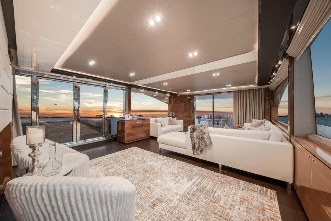a large modern looking living room aboard PRONTO Yacht for Sale
