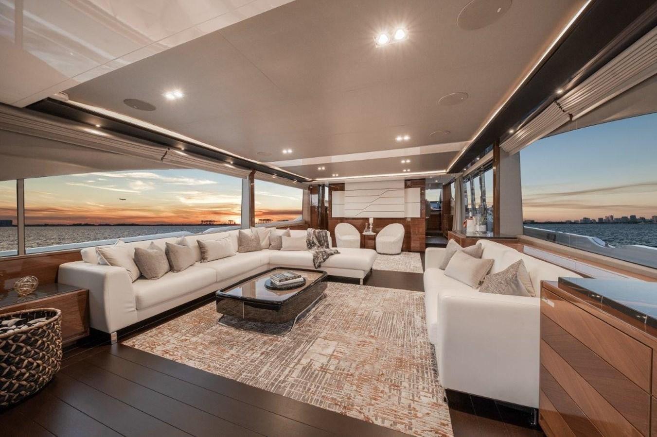 a living room with a large window aboard PRONTO Yacht for Sale