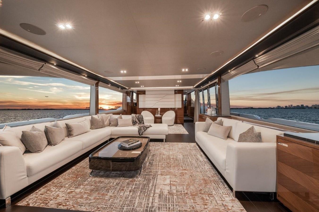 a living room with a large window aboard PRONTO Yacht for Sale
