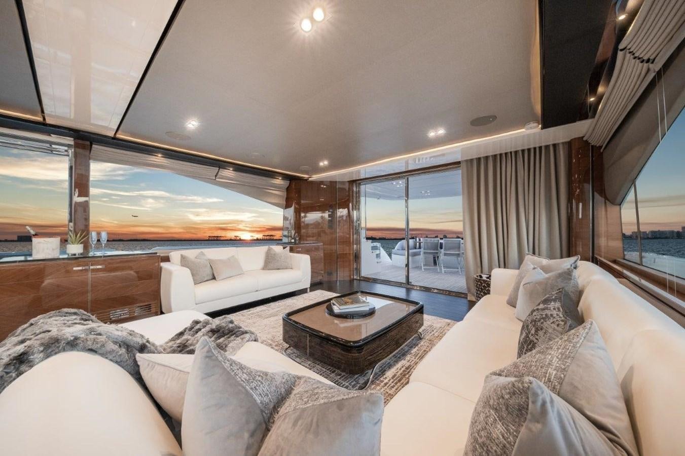 a living room with a large window aboard PRONTO Yacht for Sale