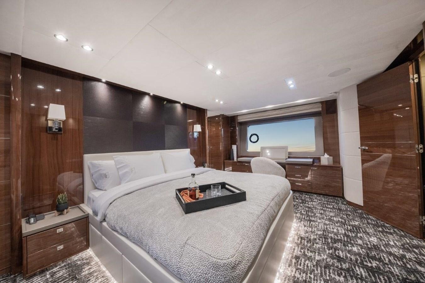 a large bedroom with a large bed aboard PRONTO Yacht for Sale