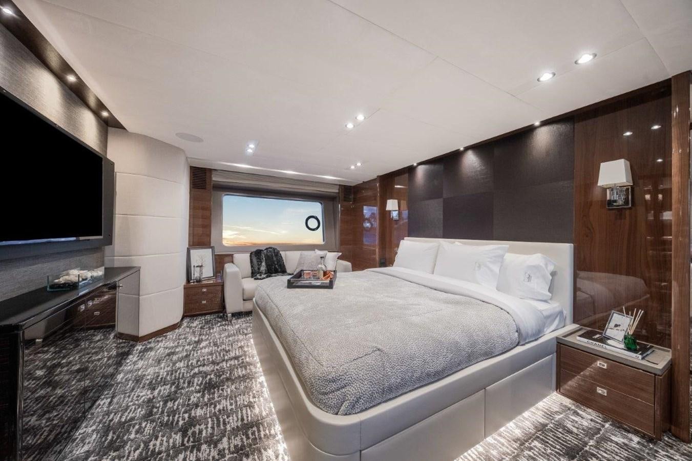 a large bedroom with a large bed aboard PRONTO Yacht for Sale